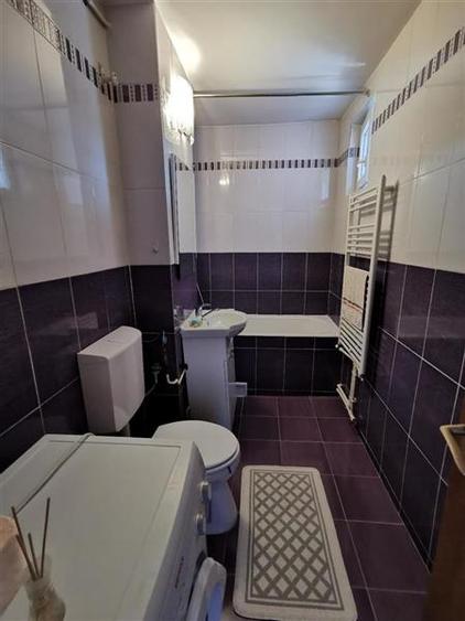 Apartament cu 2 camere semidecomandat, mobilat în Centrul Civic