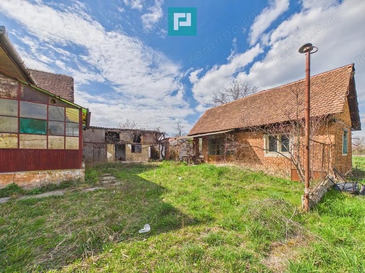 Casă cu Teren 1800 Mp în Buteni