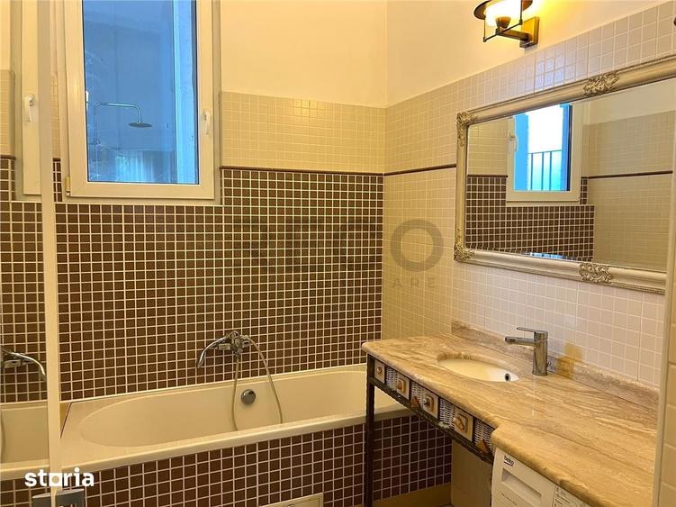Apartament cu 4 camere semidecomandat în Central