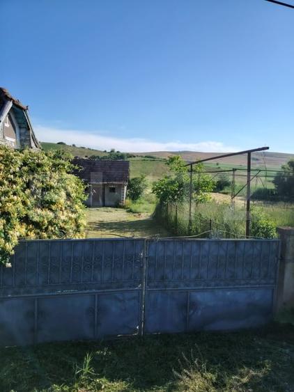 Casă individuală cu 2 camere cu Teren 3750 Mp în Ceanu Mare