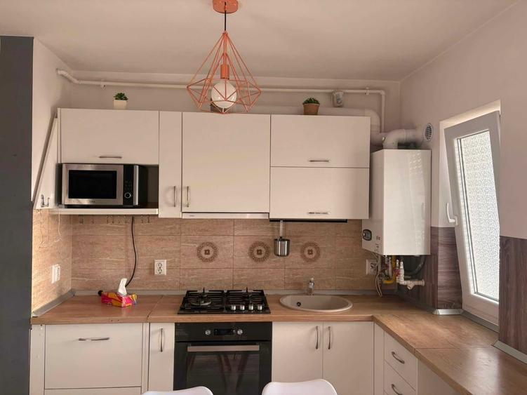 Apartament cu 3 camere decomandat în Sud