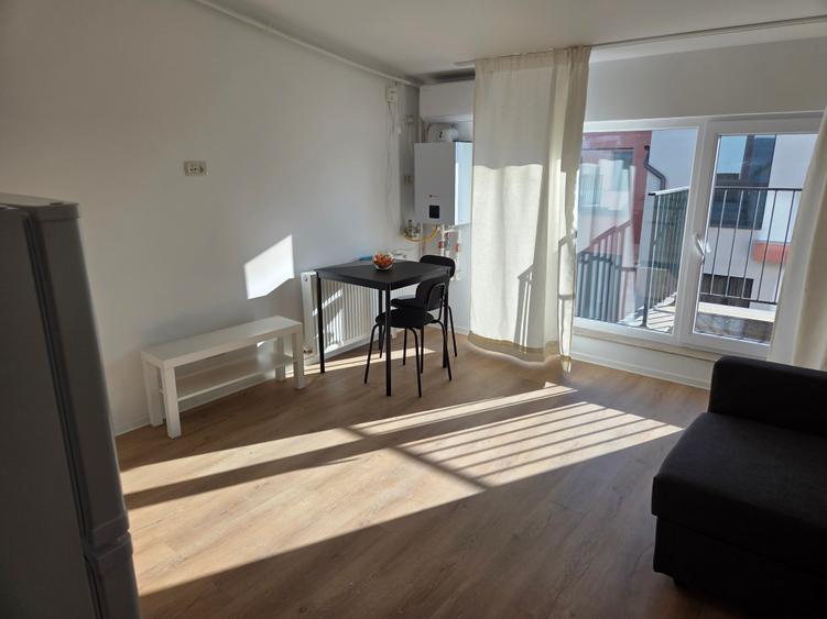 Garsoniera utilata,mobilata ,totul nou ,prima inchiriere ,str Oituz nr 71 - 9