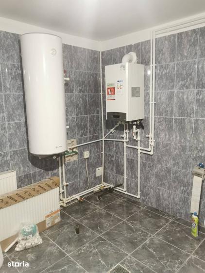 Casă cu 4 camere cu Teren 1000 Mp în Central
