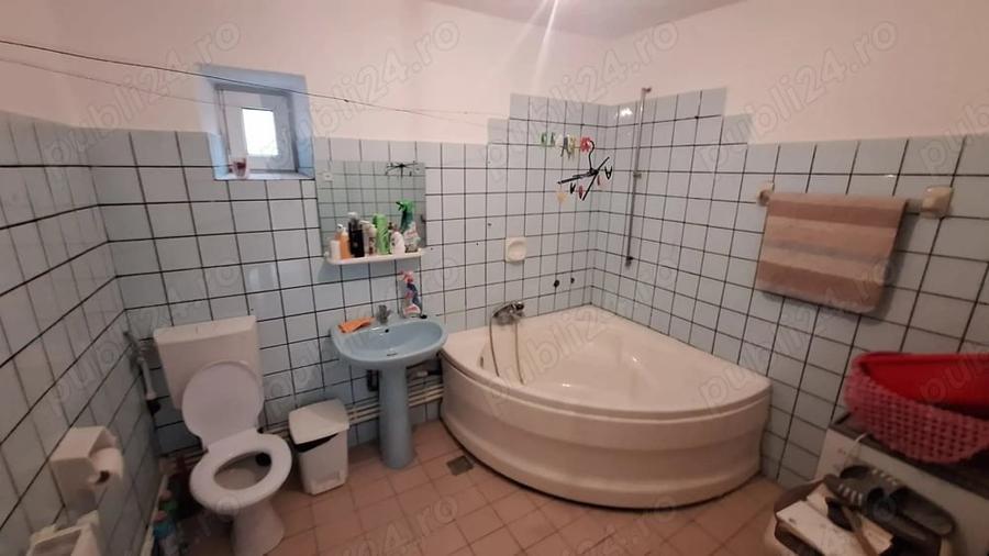 Casă cu 4 camere cu Teren 1000 Mp în Central