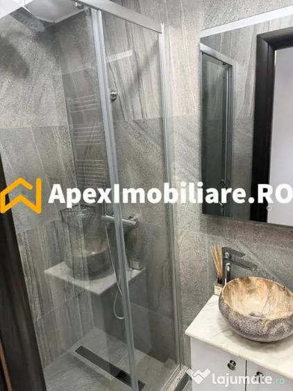 Apartament cu 4 camere decomandat în Titan