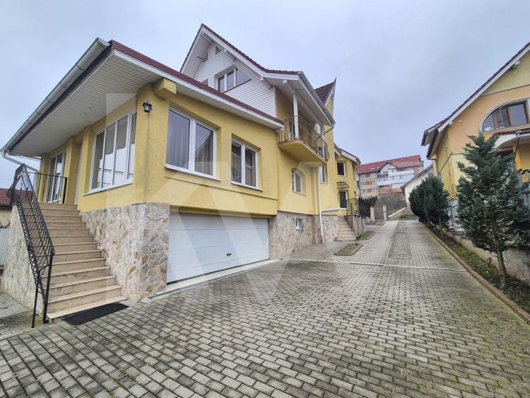 CASĂ INDIVIDUALĂ de inchiriat – 330 mp, 8 camere, 5 bai, garaj dublu, gradina - 8