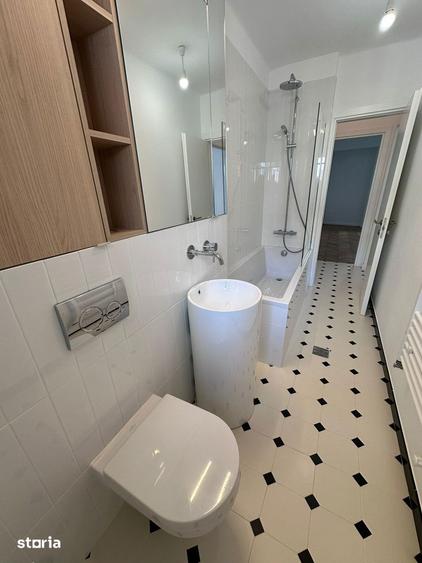 Apartament cu 3 camere în Romană