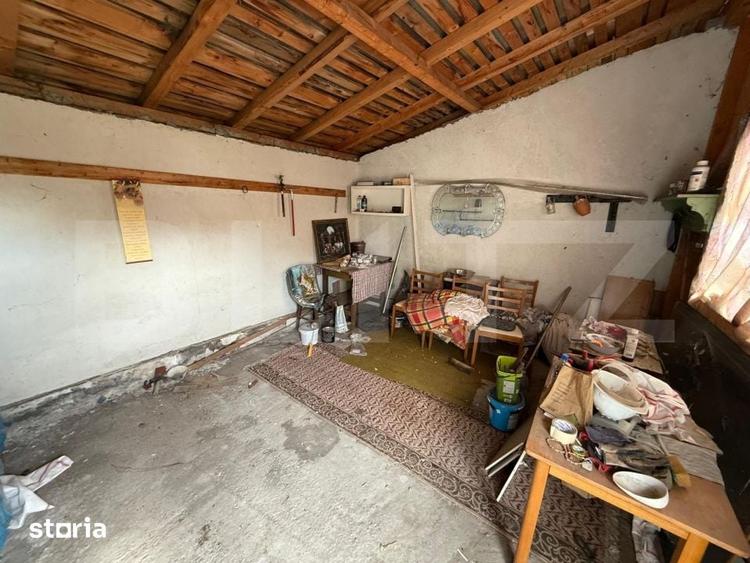 Casă cu 6 camere cu Teren 3082 Mp în Coțofenii din Față