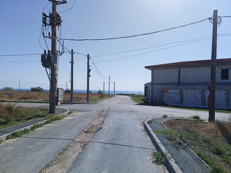 Vând teren intravilan 1050mq,pe colț, al treilea rand la mare, zona Epava - 1