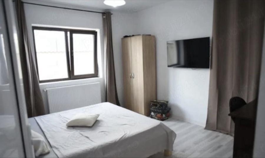 Casă cu 4 camere în Lumina
