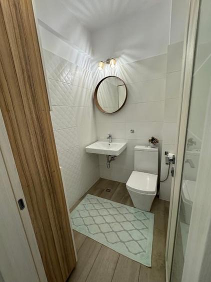 Apartament in bloc nou Fratii Golesti,terasa spectaculoasa,parcare subterana - 11