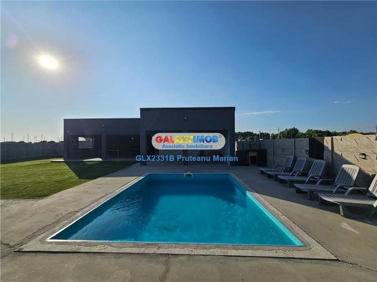 Vanzare casa de Lux cu piscina in aer liber situata in comuna Clinceni - 4