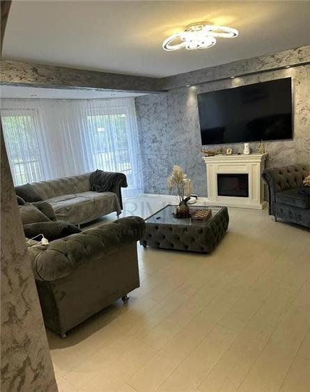 Casa individuala - teren 1000 mp - garaj - 1