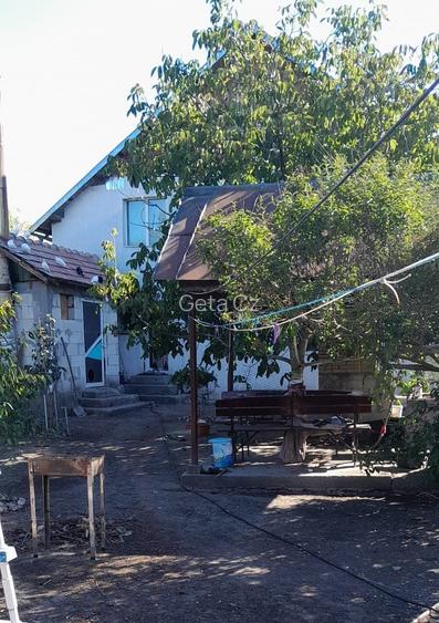 Casa mare cu teren 7 camere Strada Principala 16 km de Slatina