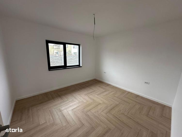 Casa pe parter cu incalzire in pardoseala si tripan - 8