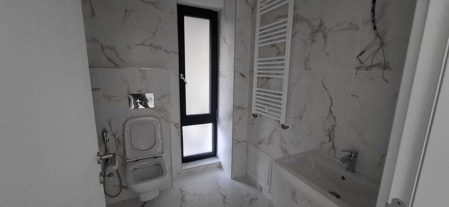 Apartament cu 2 camere decomandat în Cârlig