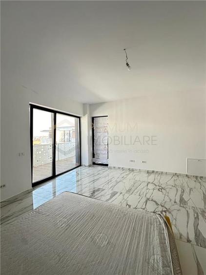 GIROC - 2 CAM - SPATIOS - PARCARE SUBTERANA - TERASA MARE - 2