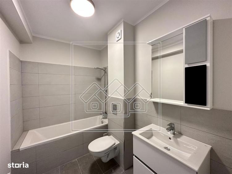 Ap.2 camere, finisat la cheie, etaj 1 - terasa 18 mp - Cristian - 9