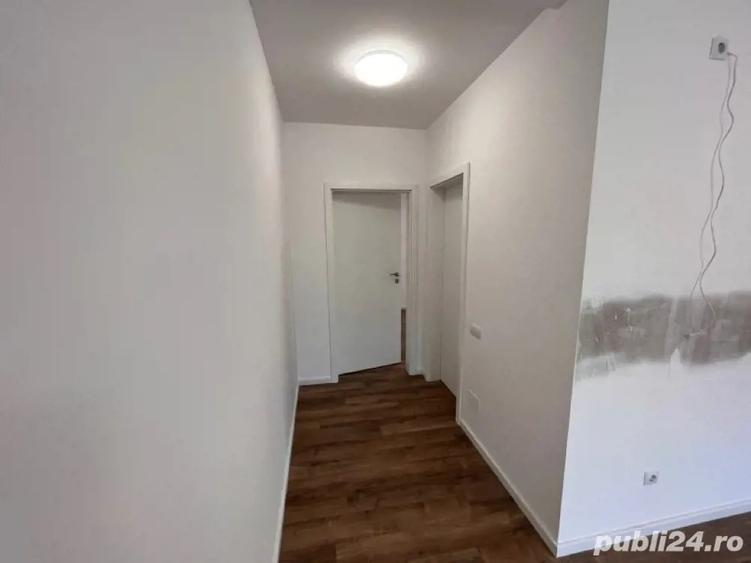 Ap de vanzare cu 2 camere ?i gradina nou finisat in Flore?ti zona Tau?iului parcare - 9