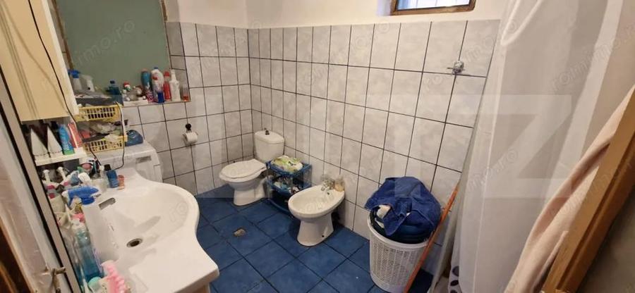 ROMANESTI, casa modesta, 651 mp teren, zona foarte buna - 12