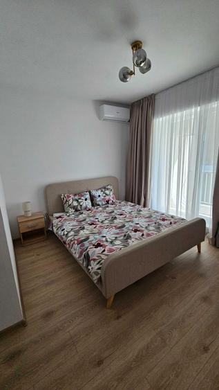 Apartment 2 camere de inchiriat! 10 min metrou. Parcare acoperita. 71mp. 2 balcoane. Bloc nou. Etaj 1 - 1