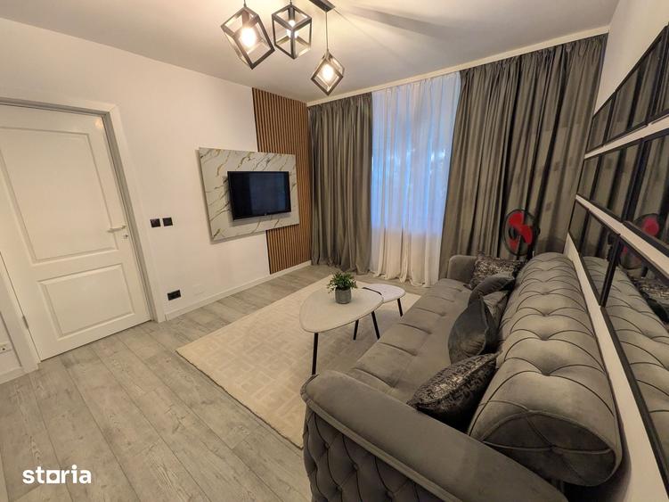 Apartament cu 2 camere semidecomandat în Calea București