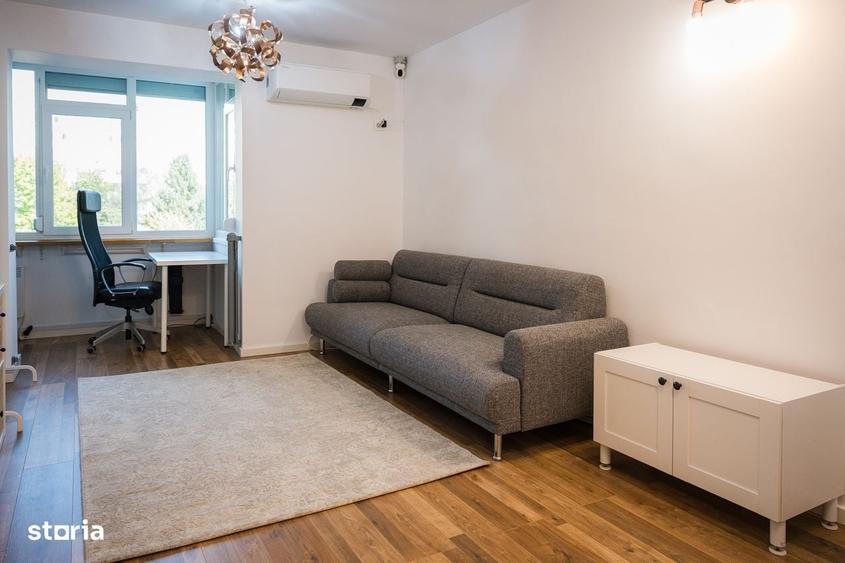 Apartament cu 3 camere semidecomandat în Costin Georgian