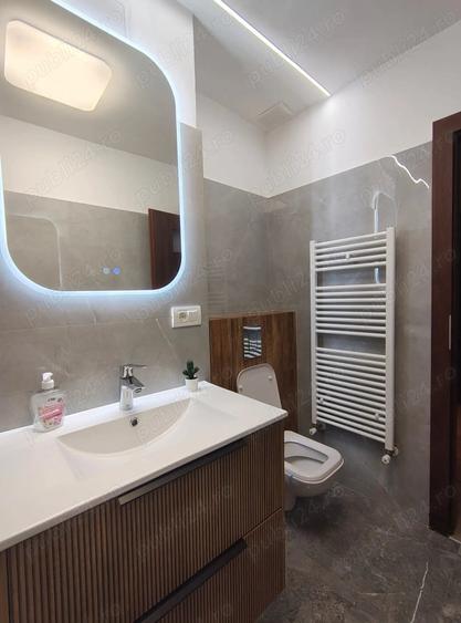 Apartament cu 3 camere decomandat în Dâmbovița