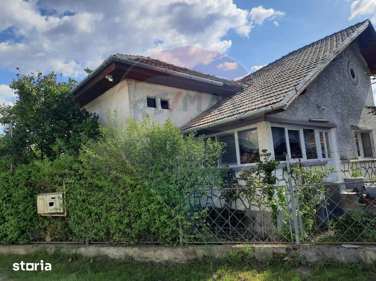 Casă cu 2 camere cu Teren 1836 Mp în Beclean
