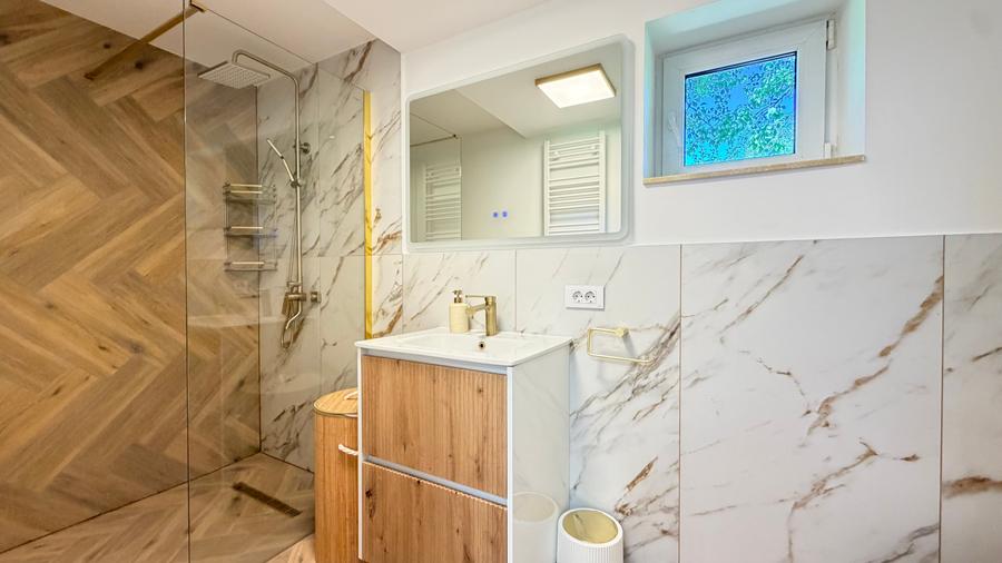 Casă individuală cu 2 camere cu Teren 550 Mp în Podu Oltului