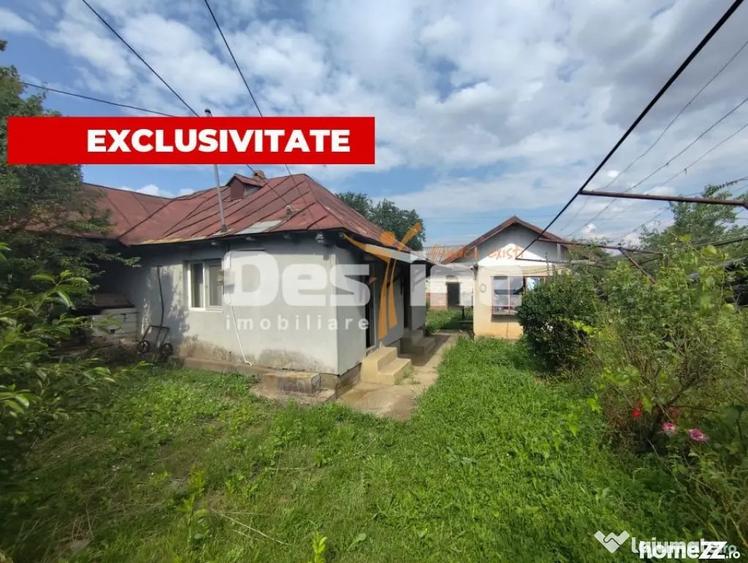Casă cu 4 camere cu Teren 1075 Mp în Cătina