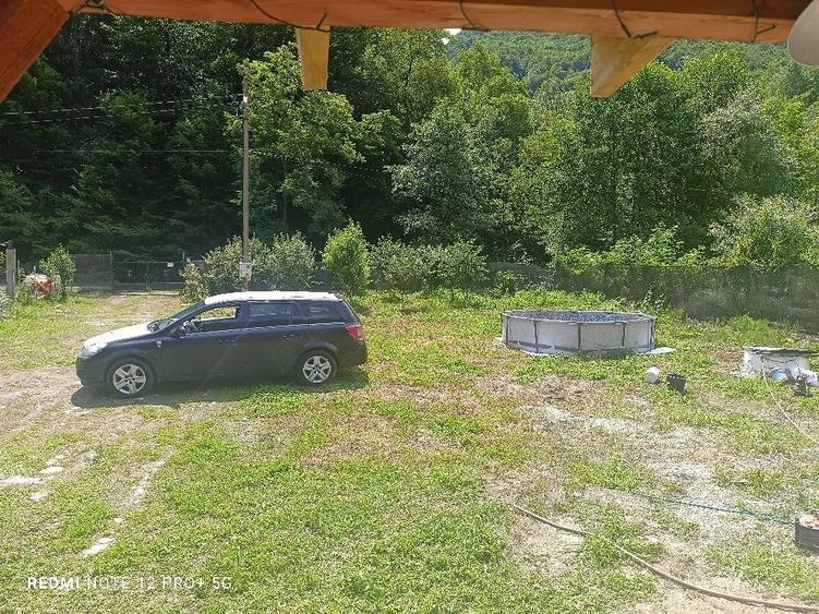Casă cu Teren 1046 Mp în Hărțăgani