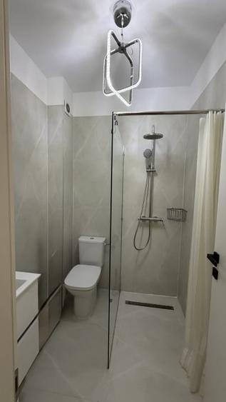 2 camere cu grădină privată de 50 mp de închiriat în Tunari  parcare inclusa - 6
