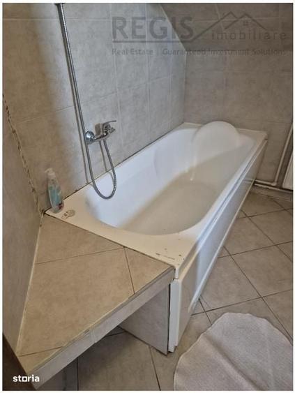 Casă cu 4 camere cu Teren 500 Mp în Central