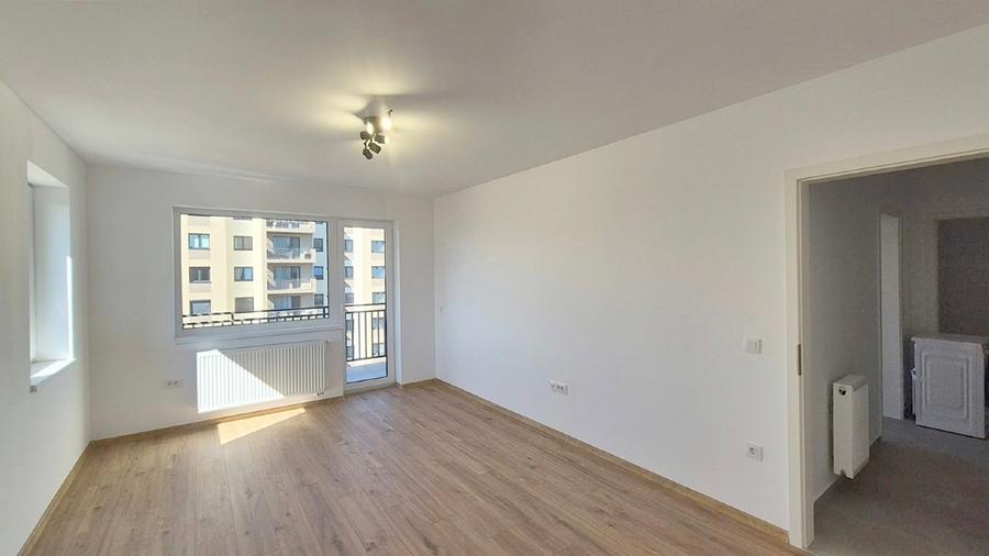 Apartament cu 3 camere decomandat în Tractorul