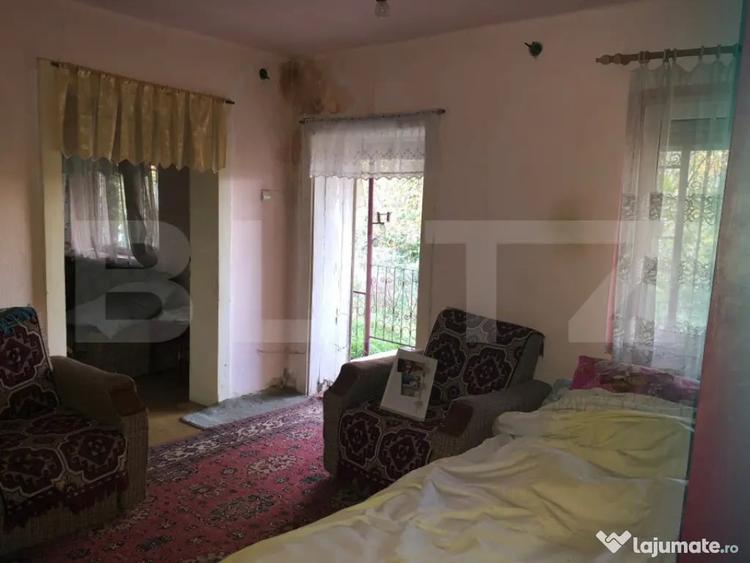 Casă cu 2 camere cu Teren 1500 Mp în Central