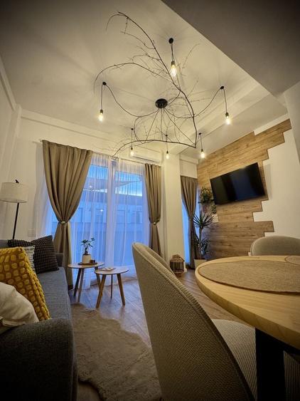 Apartament cu 2 camere decomandat în Sânmartin