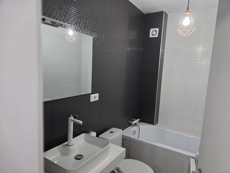 Apartament cu 2 camere decomandat în Tomești