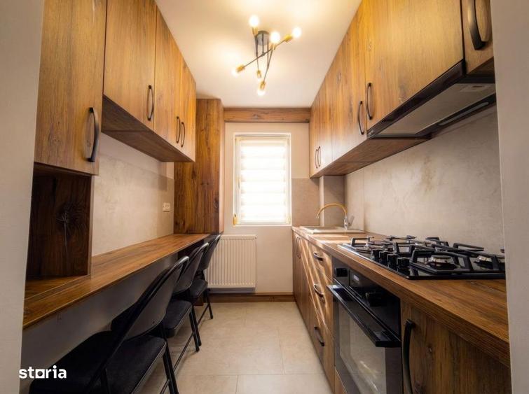 Apartament cu 3 camere semidecomandat, mobilat în Central