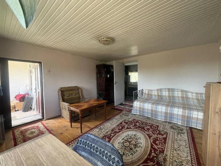 Casă cu 4 camere cu Teren 3400 Mp în Comarna