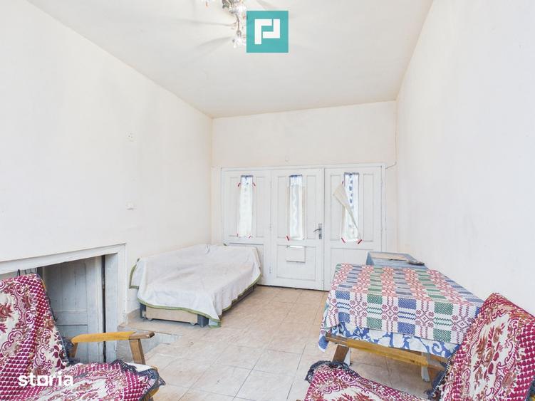 Casă cu 5 camere cu Teren 2837 Mp în Buteni