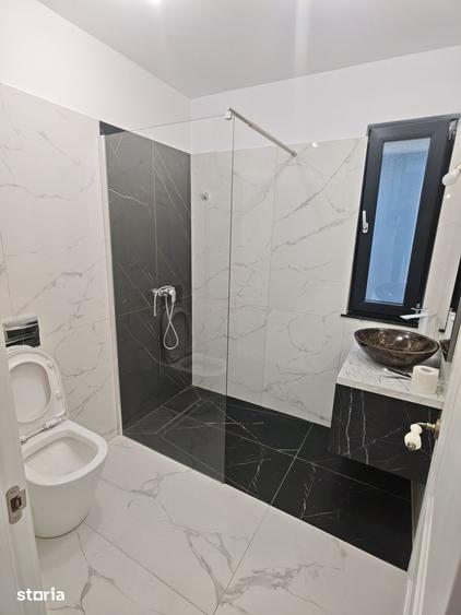 Casă cu 4 camere cu Teren 220 Mp în Central
