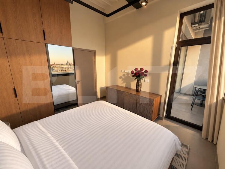 Apartament cu 2 camere semidecomandat, mobilat în Central