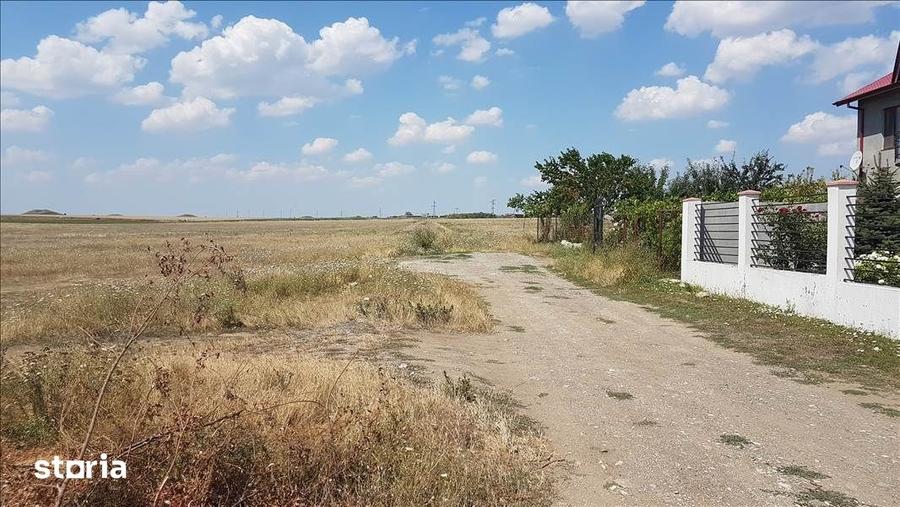TEREN INTRAVILAN 469 MP. LANGA CASE ZONA DE PERSPECTIVA PRET 17.500 E - 4