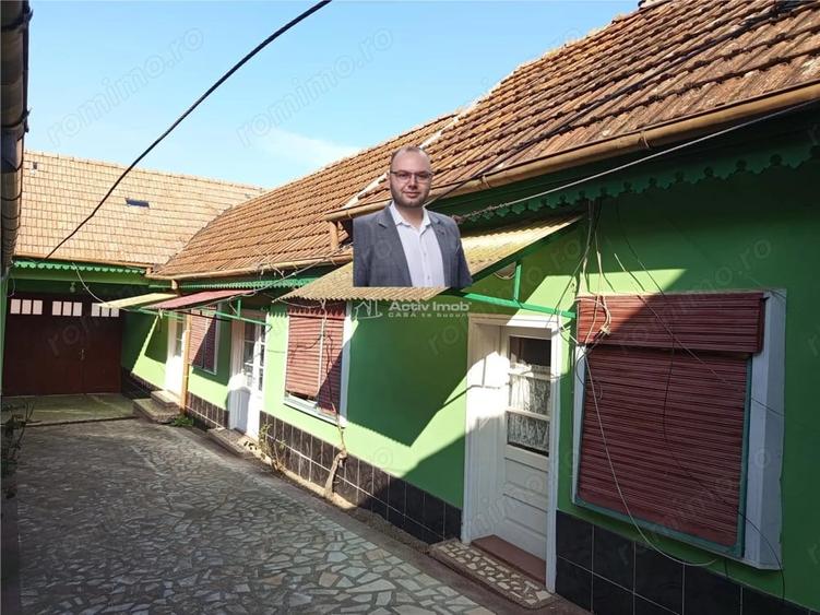 Casă cu Teren 1439 Mp în Ciclova Română