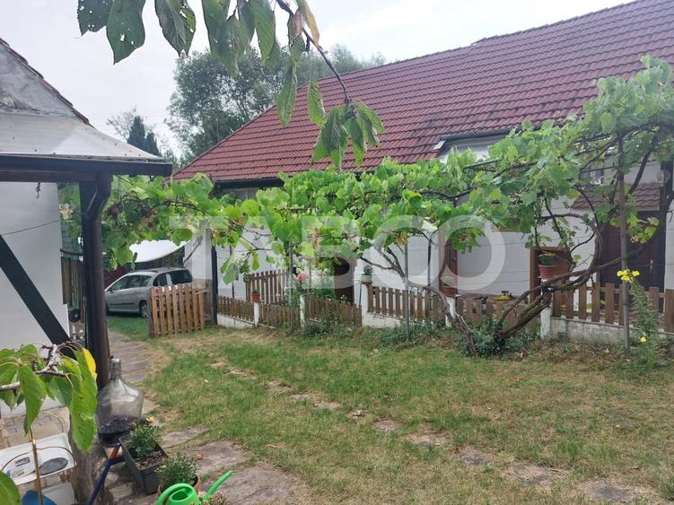 Casă individuală cu 6 camere cu Canalizare în Cisnădioara