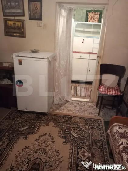 Casă cu 2 camere cu Teren 2000 Mp în Central