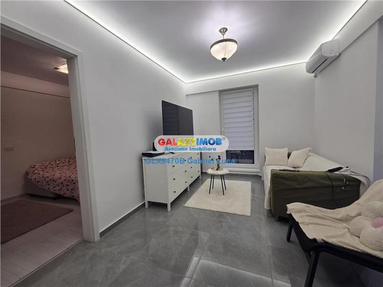 Apartament cu 2 camere semidecomandat, mobilat în Berceni