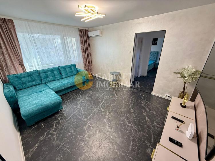 Apartament cu 2 camere semidecomandat, mobilat în Podu Roș