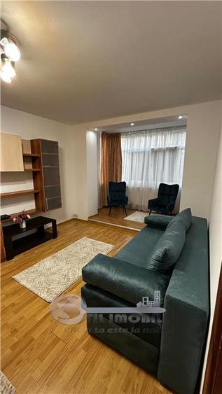 Apartament cu 2 camere semidecomandat, mobilat în Podu Roș